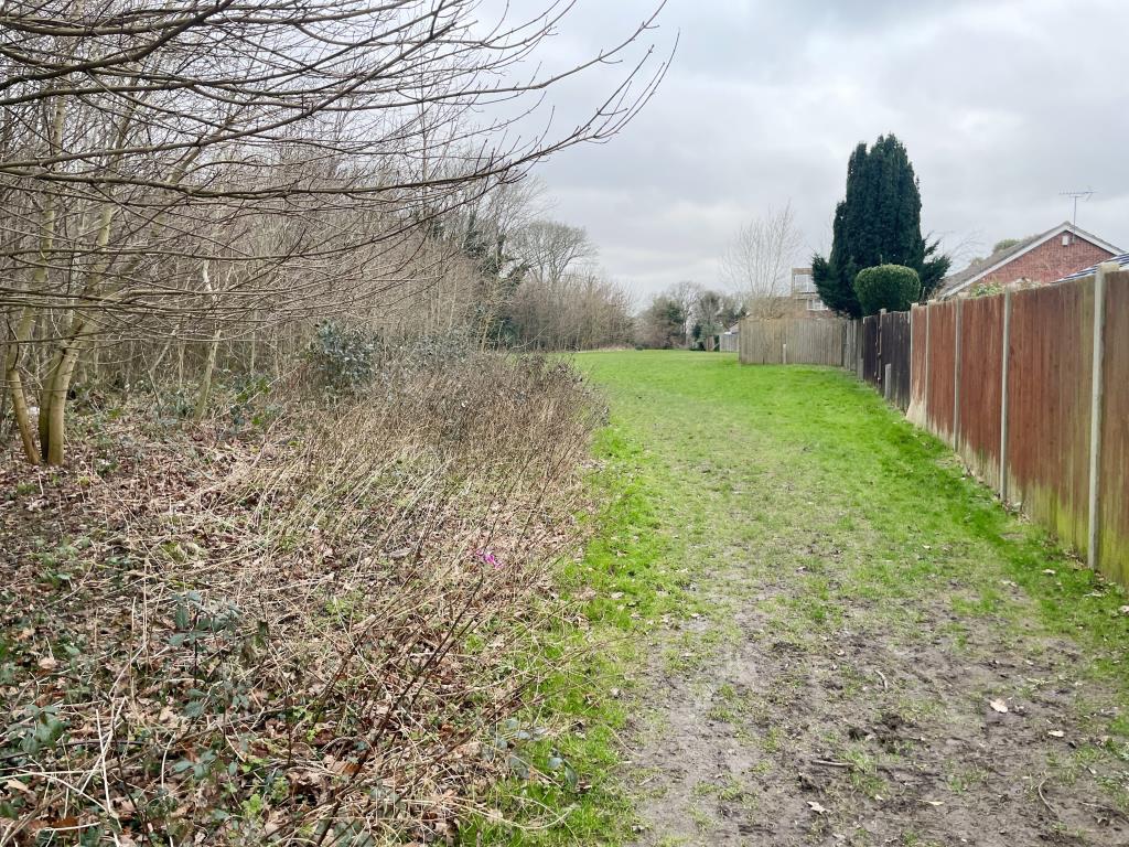 Lot: 3 - TWO FREEHOLD PARCELS OF LAND - view of parcel of land at Fowey Close